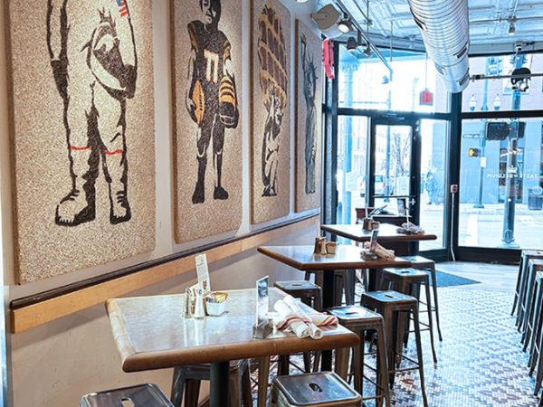 Cozy and vibrant interior of Taste of Belgium restaurant in OTR, featuring casual dining with a lively atmosphere.