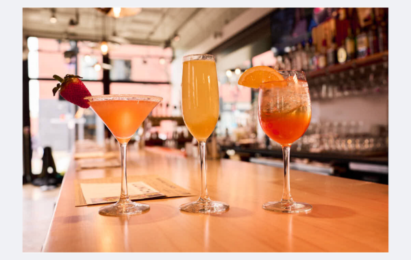 Three types of cocktail drinks offered by Taste of Belgium in Cincinnati for event catering.