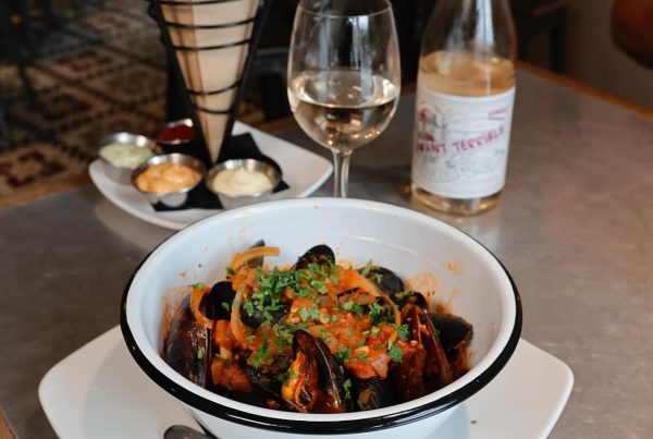 Brunch at Taste of Belgium, from savory mussels and crispy frites to a chilled glass of wine.